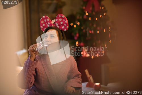 Image of woman drinking champagne at spa