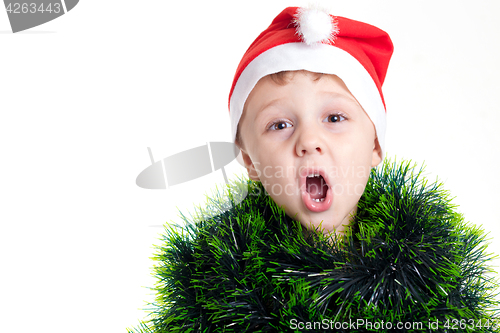 Image of Happy little smiling boy with christmas hat.