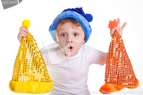 Image of Happy little smiling boy with christmas hat.