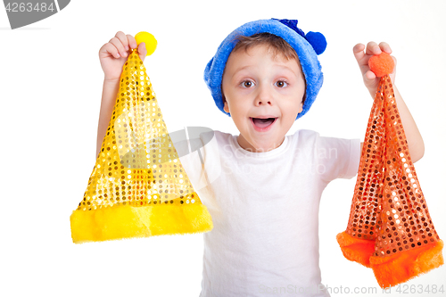 Image of Happy little smiling boy with christmas hat.