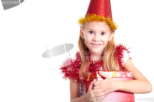 Image of Happy little smiling girl with christmas gift box.
