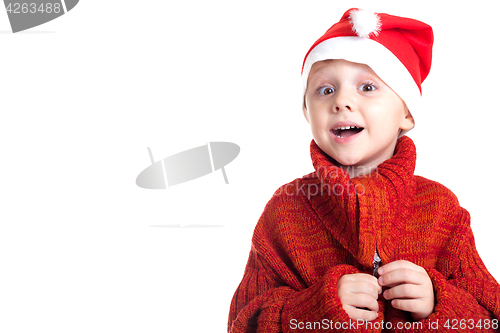 Image of Happy little smiling boy with christmas hat.