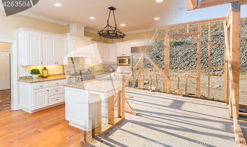 Image of Transition of Beautiful New Home Kitchen From Framing To Complet