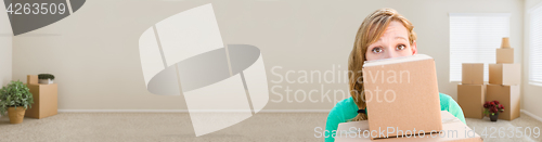 Image of Banner of Happy Young Adult Woman Holding Moving Boxes In Empty 