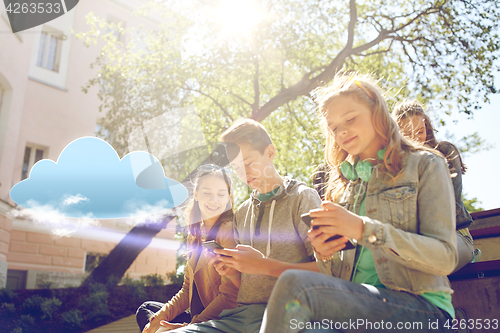 Image of teenage friends with smartphone and headphones