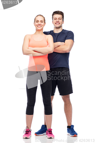 Image of happy sportive man and woman