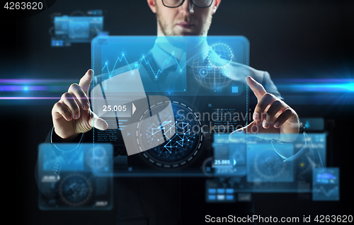 Image of close up of businessman touching virtual screen