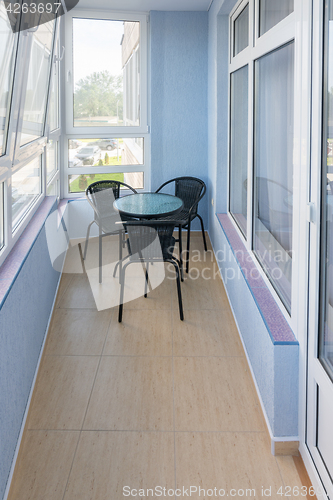 Image of Comfortable balcony in the apartment of a multistory apartment house