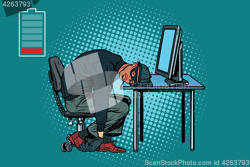 Image of Sleeping African hacker at the computer