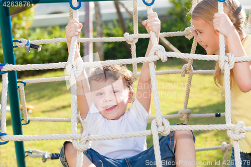 Image of happy children playing on the playground