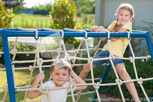 Image of happy children playing on the playground