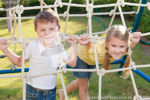 Image of happy children playing on the playground