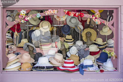 Image of Open market stall with summer straw hats