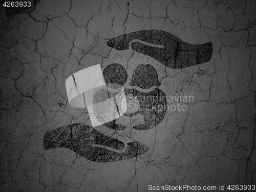 Image of Insurance concept: Family And Palm on grunge wall background