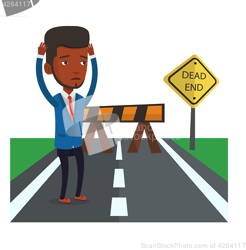 Image of Businessman looking at road sign dead end.