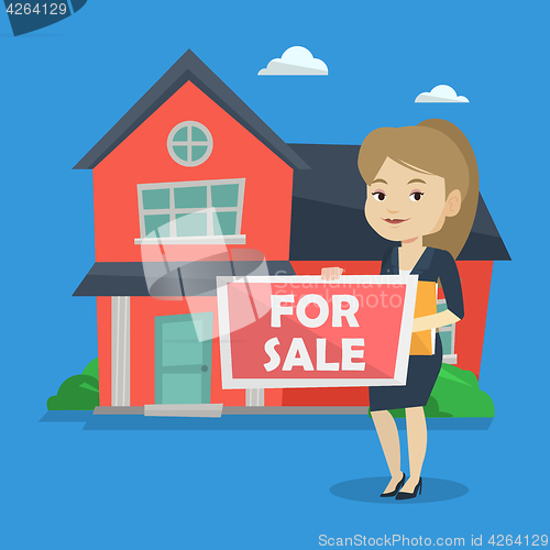 Image of Young female realtor offering house.