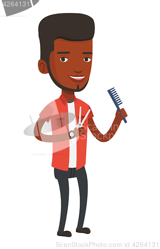 Image of Barber holding comb and scissors in hands.