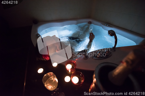 Image of man relaxing in the jacuzzi