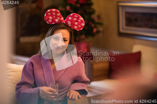 Image of woman drinking champagne at spa