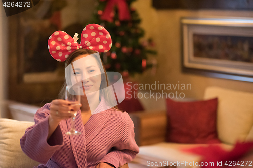 Image of woman drinking champagne at spa