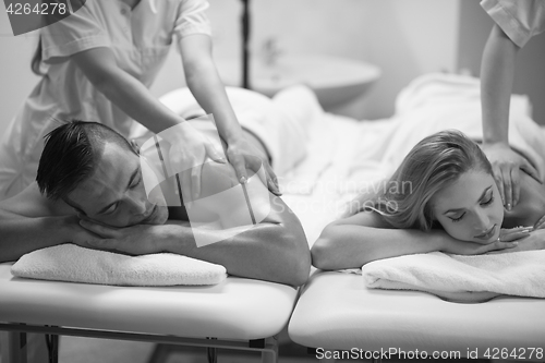 Image of couple receiving a back massage