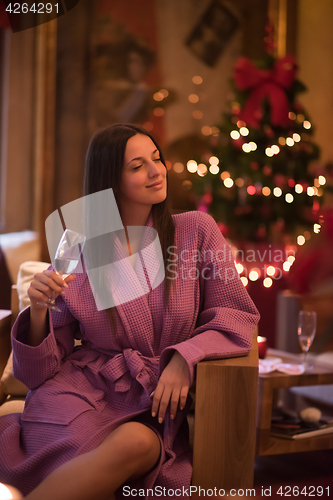 Image of woman drinking champagne at spa