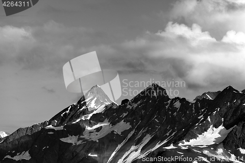 Image of Black and white view on summer mountains with snow