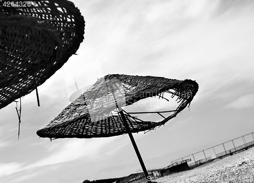 Image of Black and white old sunshade with hole 