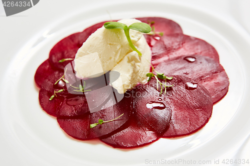 Image of Beet salad with cheese and walnuts