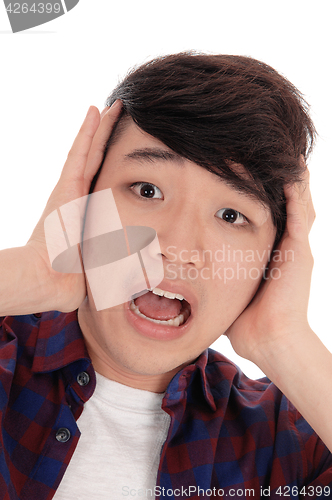 Image of Screaming Asian teenager.