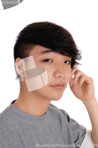Image of closeup portrait of Asian man.