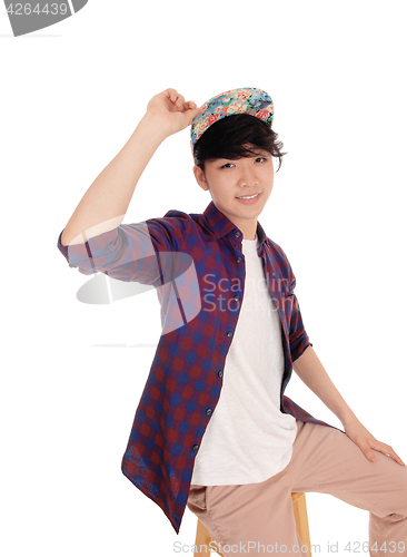 Image of Handsome Asian man with cap.