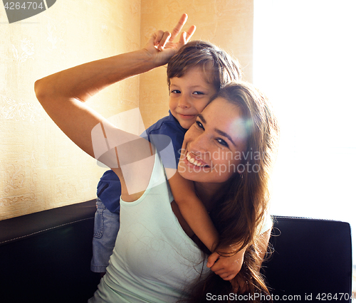 Image of mother with son, happy family at home