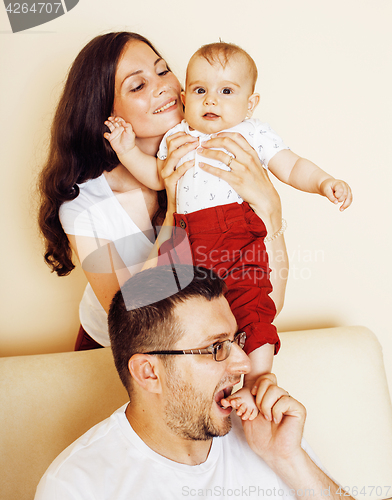 Image of young happy modern family smiling together at home. lifestyle pe