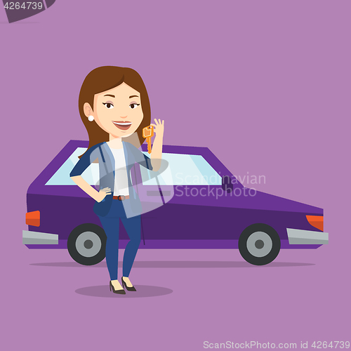 Image of Woman holding keys to her new car.