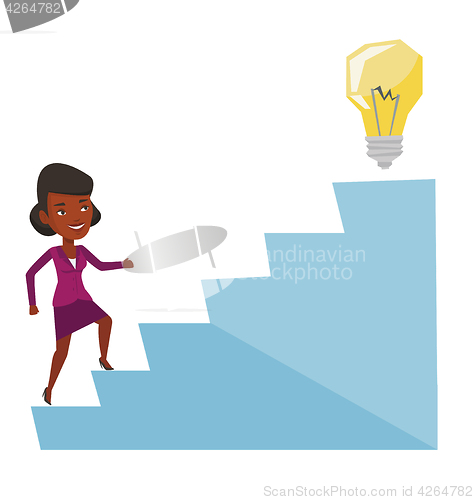 Image of Business woman walking upstairs to the idea bulb.