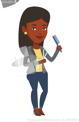 Image of Hairstylist holding comb and scissors in hands.