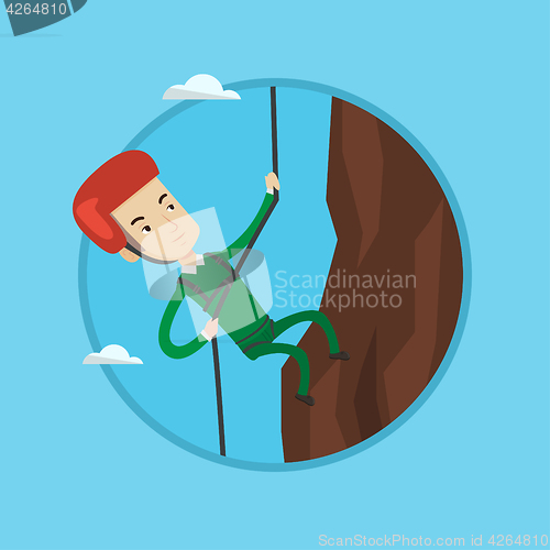 Image of Man climbing in mountains with rope.