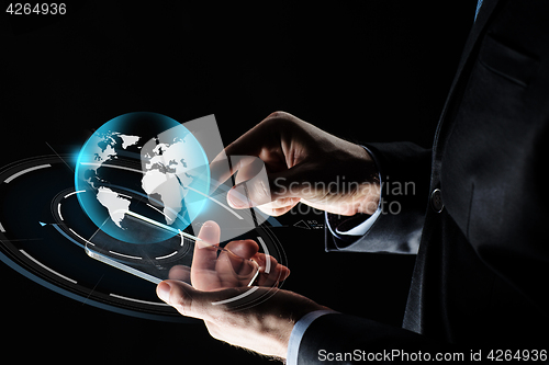 Image of businessman hands with smartphone and earth