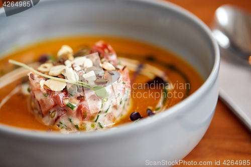Image of close up of vegetable pumpkin-ginger soup in bowl