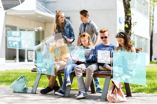 Image of group of students with notebooks at school yard