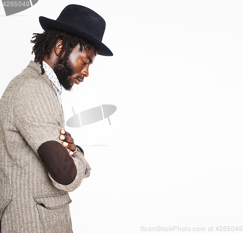 Image of young handsome afro american boy in stylish hipster hat gesturin