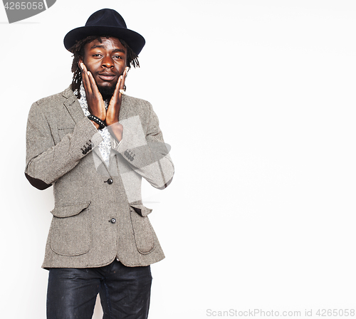 Image of young handsome afro american boy in stylish hipster hat gesturin