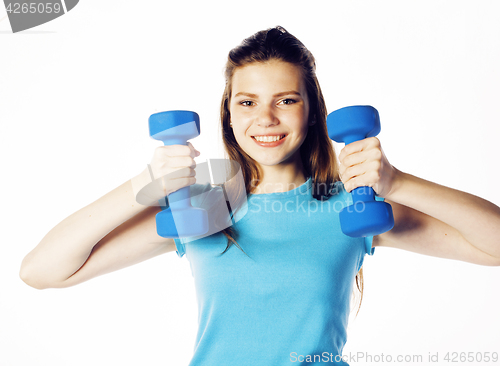 Image of young pretty slim blond woman with dumbbell isolated cheerful smiling, measuring herself, diet people concept on white background