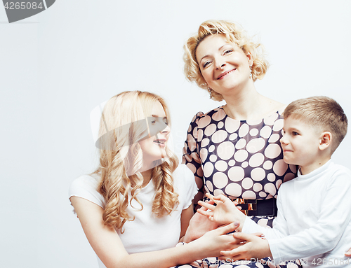 Image of happy smiling family together posing cheerful on white background, lifestyle people concept, mother with son and teenage daughter isolated 