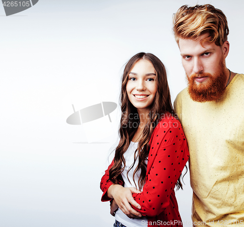 Image of young pretty teenage couple, hipster guy with his girlfriend hap