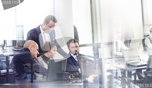 Image of Business team working in corporate office.
