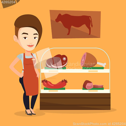 Image of Butcher offering fresh meat in butchershop.