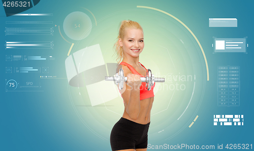 Image of happy young sporty woman exercising with dumbbell