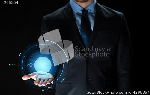 Image of close up of businessman with virtual projection